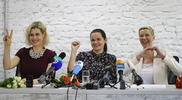 Maria Kolesnikova, a representative of Viktor Babariko, right, Svetlana Tikhanovskaya, candidate for the presidential elections, centre, and wife of non-registered candidate Valery Tsepkalo, Veronika Tsepkalo, gestures during a news conference in Minsk, Belarus, Friday, July 17, 2020. Tikhanovskaya said at a news conference Friday that she would unite efforts with the campaigns of Valery Tsepkalo and Viktor Babariko, who were denied registration. She added that she's also open to coordination with three other candidates left on the ballot. (Photo by Sergei Grits/AP Photo)