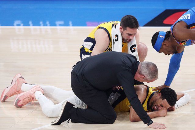 Indiana Pacers star Tyrese Haliburton grimaces after going down with an injury in Game 7 of the NBA Finals on Sunday, June 22, 2025. He tore his right Achilles tendon during the first quarter. (Photo by Justin Ford/Getty Images)