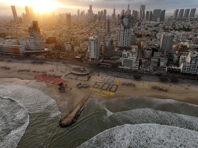 Israelis gather to mark the 600th day of the war in front of the US Embassy building and demonstrate demanding an end to the war in Gaza and the return of 58 Israeli hostages from Gaza in the coastal area of Tel Aviv, Israel on May 28, 2025. Israelis complained to US President Donald Trump about Prime Minister Benjamin Netanyahu and the Israeli government and demanded that Trump put pressure on Netanyahu. (Photo by Yair Palti/Anadolu via Getty Images)