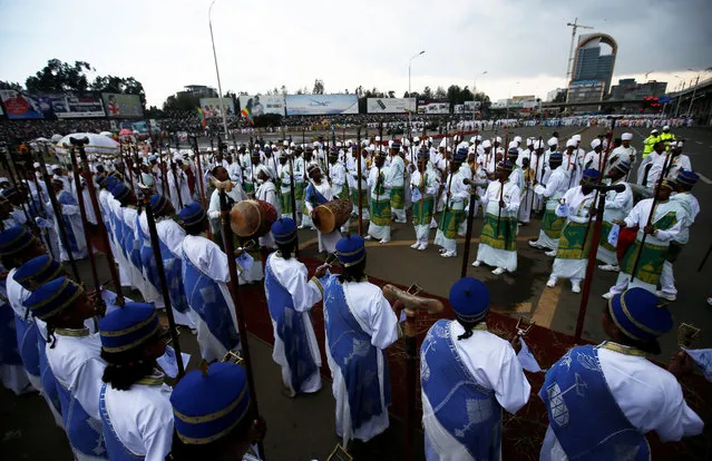A church choir performs during the Meskel Festival to commemorate the discovery of the true cross on which Jesus Christ was crucified on, at the Meskel Square in Ethiopia's capital Addis Ababa, September 26, 2016. (Photo by Tiksa Negeri/Reuters)