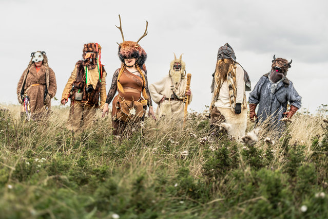 Members of Hastings Wildmen (and Women) take in part in Wilde Volk near Rottingdean, East Sussex, UK on July 28, 2025, a festival exploring pagan and masked rituals across northern and eastern Europe. (Photo by Jon Santa Cruz)
