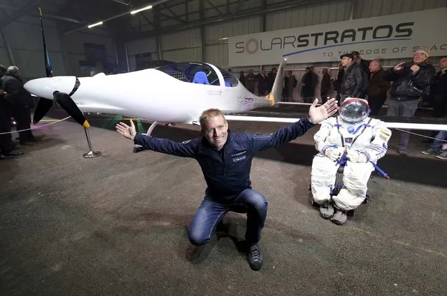 Pilot Raphael Domjan of Solarstratos, a solar-powered two-seater aircraft with a mission to fly some 24,000m (78,000 feet) above earth set to take place in 2018 poses during the roll out presentation in Payerne, Switzerland December 7, 2016. (Photo by Denis Balibouse/Reuters)