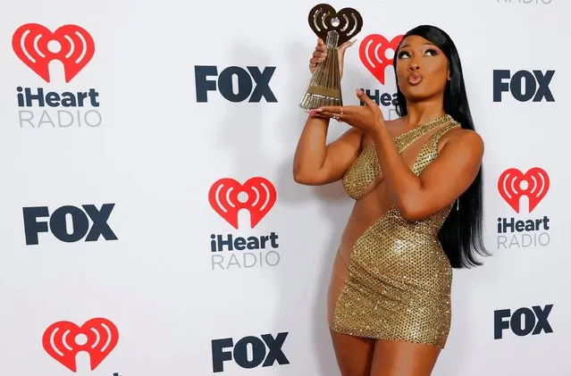 American rapper Megan Thee Stallion poses with her award for Best Collaboration at the 2021 iHeartRadio Music Awards at Dolby Theatre in Los Angeles, California, U.S., May 27, 2021. (Photo by Mario Anzuoni/Reuters)