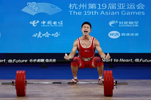 North Korea's Ri Wonju reacts at the 67Kg Weightlifting Group A during Asian Games at Xiaoshan Sports Centre Gymnasium in Hangzhou, China on October 1, 2023. (Photo by Ann Wang/Reuters)