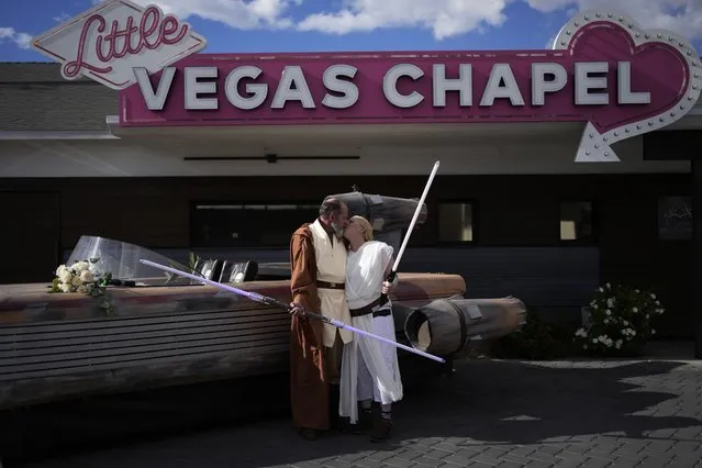 Michael Van Worner, left, kisses Erin Clemens after their Star Wars themed wedding at The Little Vegas Chapel, Thursday, May 4, 2023, in Las Vegas. The chapel held Star Wars weddings for Star Wars Day – observed by fans globally on May 4 with a slight change in the iconic catchphrase; from “May the Force be with you” to “May the Fourth be with you”. (Photo by John Locher/AP Photo)