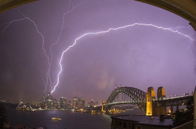 Lightning over Sydney Tuesday, October 14, 2014. (Photo by Aaron Saye)