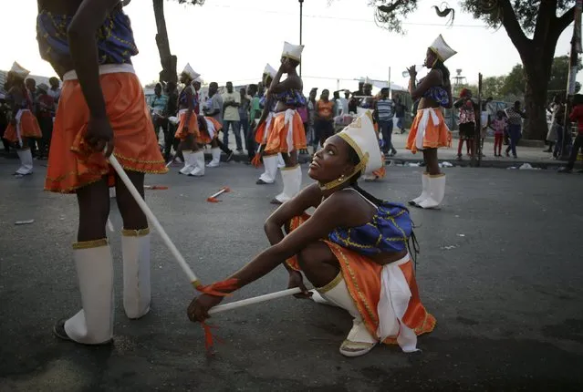 Revellers take a break during the Carnival 2016 parade in Port-au-Prince, Haiti, February 8, 2016. (Photo by Andres Martinez Casares/Reuters)