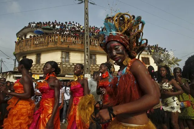 Women take part in a parade during the Popo (Mask) Carnival of Bonoua, in the east of Abidjan, April 18, 2015. (Photo by Luc Gnago/Reuters)