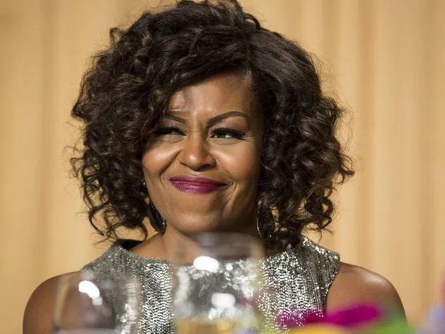 U.S. First Lady Michelle Obama reacts to the monologue by Saturday Night Live comedian Cecily Strong at the 2015 White House Correspondents’ Association Dinner in Washington April 25, 2015. (Photo by Joshua Roberts/Reuters)