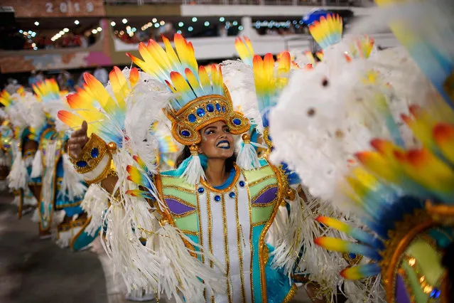 Members of the Uniao da Ilha samba school perform during the second night of Rio's Carnival parade at the Sambadrome in Rio de Janeiro, Brazil early on March 4, 2019. (Photo by Mauro Pimentel/AFP Photo)