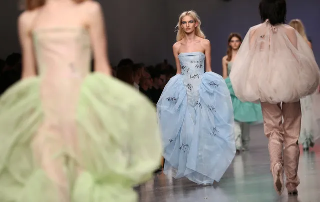 Models present creations at the Central St Martin's catwalk show during London Fashion Week in London, Britain February 17, 2017. (Photo by Neil Hall/Reuters)