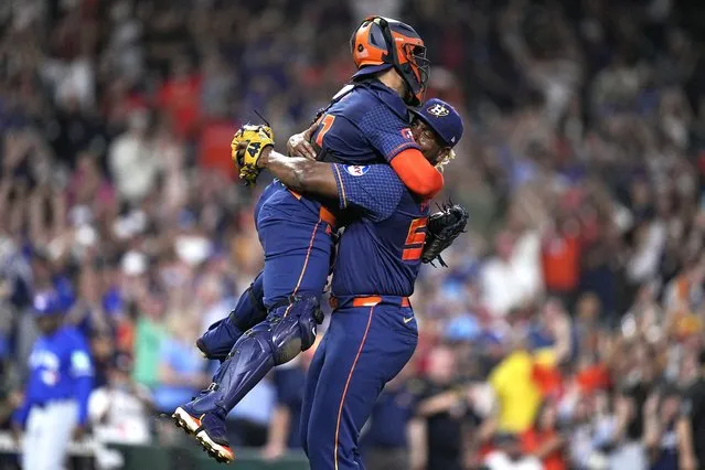 Houston Astros starting pitcher Ronel Blanco, right, celebrates with catcher Yainer Diaz after throwing a no hitter in a baseball game against the Toronto Blue Jays, Monday, April 1, 2024, in Houston. (Photo by Kevin M. Cox/AP Photo)