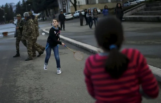 Children play on the street in Nagorno-Karabakh's city of Stepanakert, April 7, 2016. (Photo by Reuters/Staff)