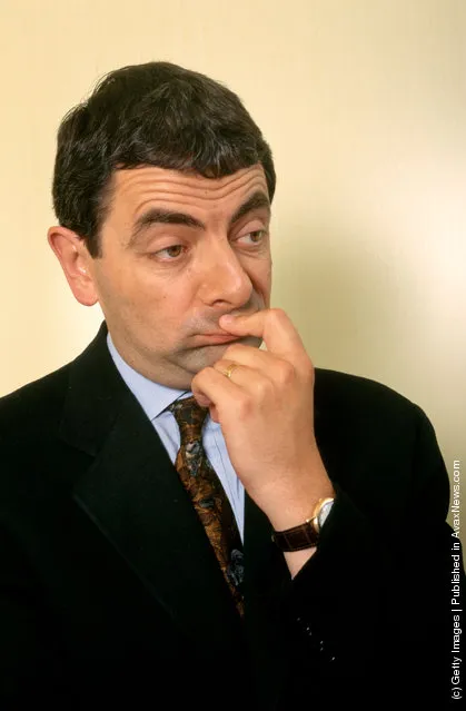 Rowan Atkinson poses for photographers before attending the world movie premiere of his BEAN movie