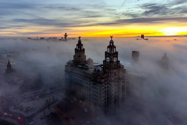 The Royal Liver Buildings surrounded by the early morning fog in Liverpool on Tuesday, December 14, 2021. (Photo by Peter Byrne/PA Images via Getty Images)