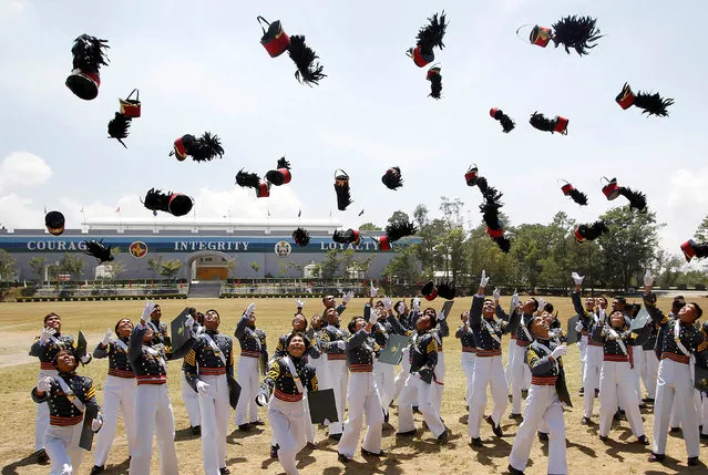 New officers of the Armed Forces of the Philippines throw their hats during graduation ceremonies at the Philippine Military Academy in Baguio city, in northern Philippines March 12, 2017. (Photo by Harley Palangchao/Reuters)