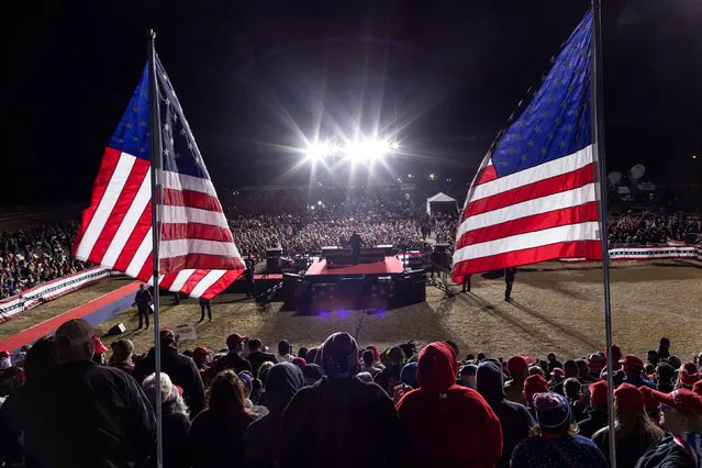Supporters of former U.S. President Donald Trump look on as Trump holds a rally in Florence, Arizona, U.S., January 15, 2022. (Photo by Carlos Barria/Reuters)