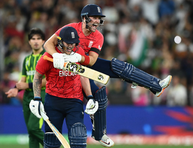 Ben Stokes and Liam Livingstone of England celebrate winning the ICC Men's T20 World Cup Final match between Pakistan and England at the Melbourne Cricket Ground on November 13, 2022 in Melbourne, Australia. (Photo by Quinn Rooney/Getty Images)
