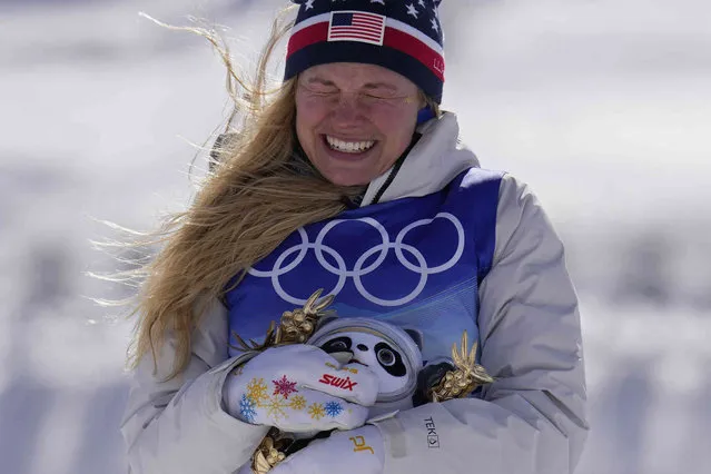Silver medal finisher Jessie Diggins celebrates during a venue ceremony after the women's 30km mass start free cross-country skiing competition at the 2022 Winter Olympics, Sunday, February 20, 2022, in Zhangjiakou, China. (Photo by Alessandra Tarantino/AP Photo)