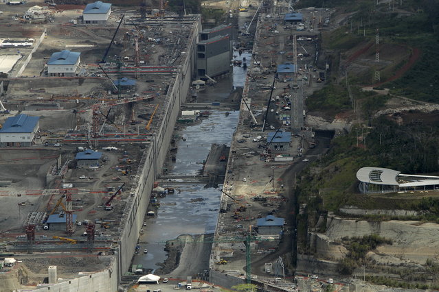 An aerial view of the construction site of the Panama Canal Expansion project is seen during an organised media tour by Italy's Salini Impregilo, in Panama City March 23, 2015. (Photo by Carlos Jasso/Reuters)