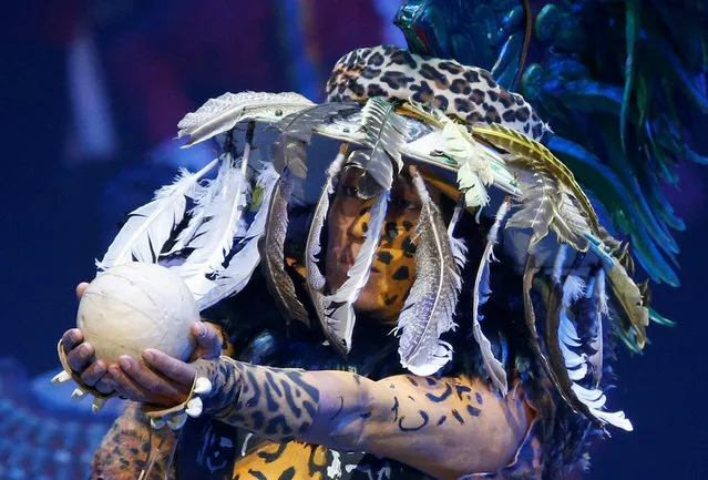 A dancer dressed in a pre-Hispanic costume performs during the opening ceremony of the 66th FIFA Congress in Mexico City, Mexico, May 12, 2016. (Photo by Henry Romero/Reuters)