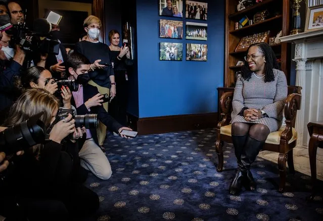 SCOTUS nominee Judge Ketanji Brown Jackson looks at the pack of press while meeting with Senator Mitt Romney(R-UT)  in his office, in Washington, DC. (Photo by Bill O'Leary/The Washington Post)