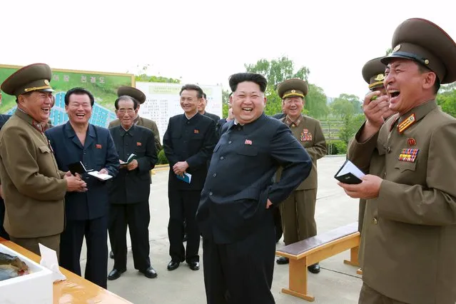 North Korean leader Kim Jong Un gives field guidance to the Sinchang Fish Farm under KPA Unit 810 in this undated photo released by North Korea's Korean Central News Agency (KCNA) May 15, 2015. (Photo by Reuters/KCNA)