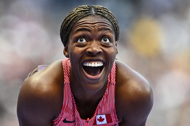 Canada's Jacqueline Madogo reacts after competing in the women's 200m repechage round of the athletics event at the Paris 2024 Olympic Games at Stade de France in Saint-Denis, north of Paris, on August 5, 2024. (Photo by Jewel Samad/AFP Photo)