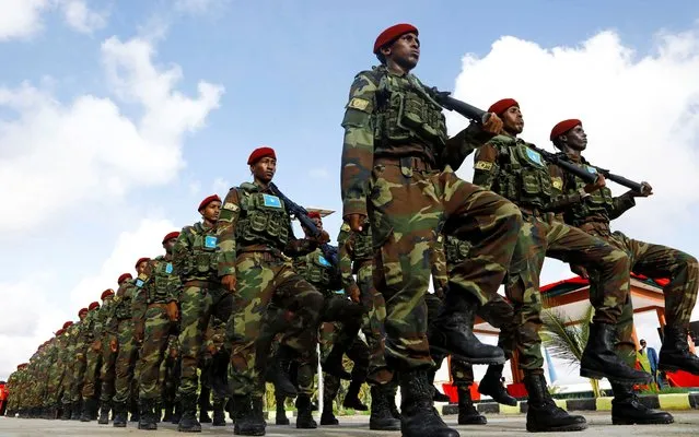 Somali military officers march in a parade during celebrations to mark the 62nd anniversary of the Somali National Armed Forces in Mogadishu, Somalia on April 12, 2022. (Photo by Feisal Omar/Reuters)
