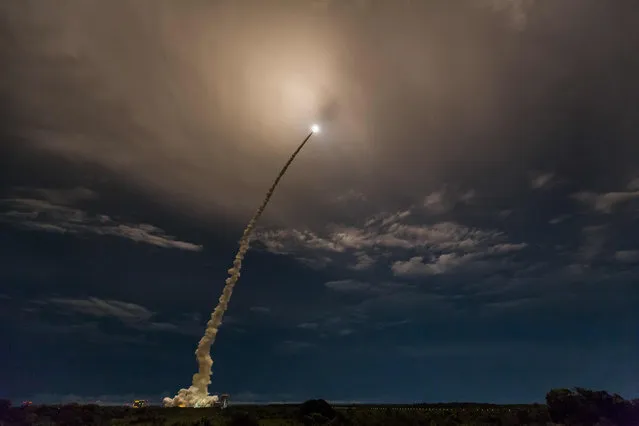 An Ariane 5 rocket lifts off from the French Guiana Space Center with two satellites onboard ViaSat-2, built by Boeing Satellite Systems for the American operator ViaSat Inc and EUTELSAT 172 B, built by Airbus Defence and Space for the French operator Eutelsat, in Kourou, French Guiana on June 1, 2017. (Photo by Jody Amiet/AFP Photo)