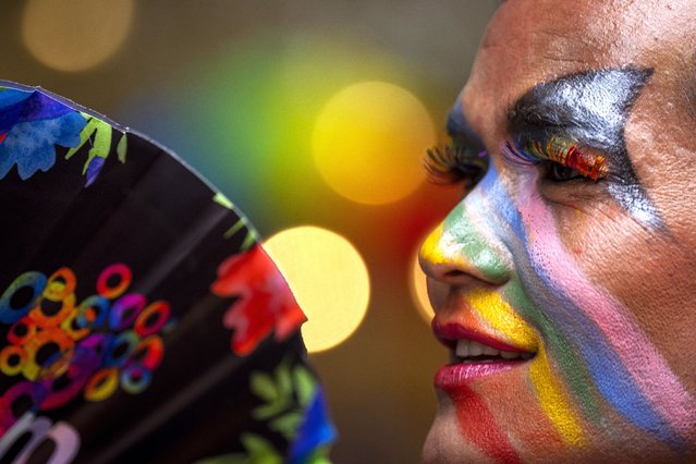 A participant has colors painted on face as LGBTQ+ people and their supporters rally during the annual pride parade, in Kathmandu, Nepal, Tuesday, August 20, 2024. (Photo by Niranjan Shrestha/AP Photo)