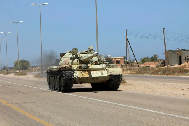 A tank from forces aligned with Libya's new unity government is seen on a road in Sirte, June 30, 2016. (Photo by Ismail Zitouny/Reuters)