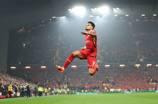 Luis Diaz of Liverpool celebrates scoring his team's first goal during the UEFA Champions League 2024/25 League Phase MD4 match between Liverpool FC and Bayer 04 Leverkusen at Anfield on November 05, 2024 in Liverpool, England. (Photo by Carl Recine/Getty Images)