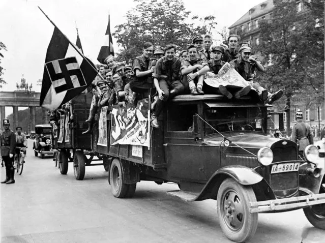 Young Nazis crowd on the back of a truck used for propaganda purposes advising people to vote “Yes” in the great plebiscite as to whether Adolf Hitler should be elected President, in Berlin, Germany, Aug. 19, 1934. (Photo by AP Photo)