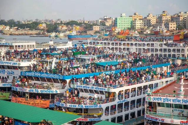 People board a ship to travel to their villages ahead of Eid-al-Adha celebrations at the Sadarghat Launch Terminal in Dhaka, Bangladesh, 08 July 2022. Eid al-Adha is the holiest of the two Muslims holidays celebrated each year, it marks the yearly Muslim pilgrimage (Hajj) to visit Mecca, the holiest place in Islam. Muslims slaughter a sacrificial animal and split the meat into three parts, one for the family, one for friends and relatives, and one for the poor and needy. (Photo by Monirul Alam/EPA/EFE/Rex Features/Shutterstock)