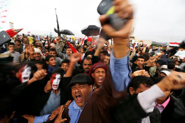 Supporters of Houthi rebels and Yemen's former president Ali Abdullah Saleh shout slogans as they attend a rally to celebrate an agreement reached by Saleh and the Houthis to form a political council to unilaterally rule the country, in Sanaa, Yemen August 1, 2016. (Photo by Khaled Abdullah/Reuters)