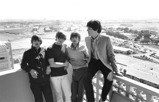 British pop group The Beatles on a hotel balcony during their tour of America, August 1964. (Photo by William Lovelace/Express)