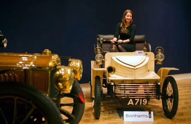 Bonhams employee Sarh Gubbins sits in a, 1903 two seater moter car, the world oldest surviving Vauxhall, on November 1, 2012 in London, England. The Car is part of a Veteran Car Sale at Bonhams and is valued at around 80,000 pounds  (Photo by Bethany Clarke)