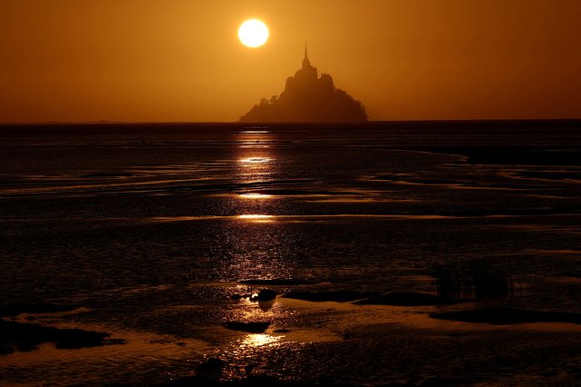 The iconic Mont Saint-Michel is seen at sunset in the French western region of Normandy, France on March 30, 2025. (Photo by Stephane Mahe/Reuters)