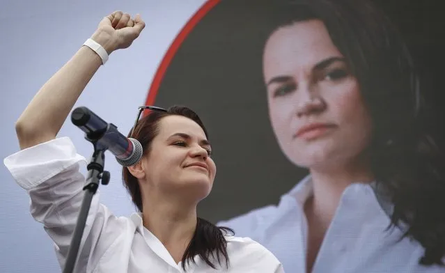 Svetlana Tikhanovskaya, candidate for the presidential elections, reacts during a meeting with her supporters in Minsk, Belarus, Sunday, July 19, 2020.  The presidential election in Belarus is scheduled for August 9, 2020. (Photo by Sergei Grits/AP Photo)