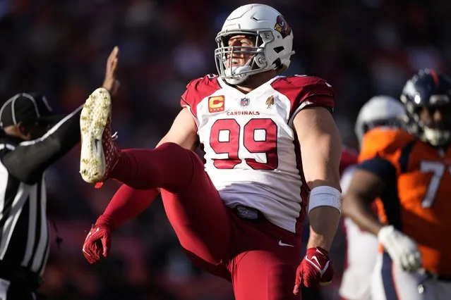 Arizona Cardinals defensive end J.J. Watt (99) celebrates his sack against the Denver Broncos during the first half of an NFL football game, Sunday, December 18, 2022, in Denver. (Photo by David Zalubowski/AP Photo)
