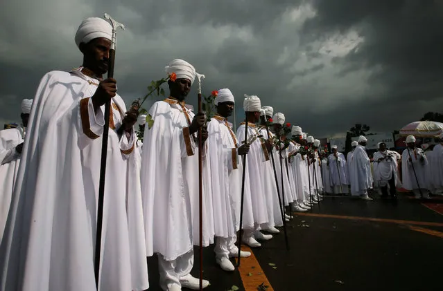 A church choir performs during the Meskel Festival to commemorate the discovery of the true cross on which Jesus Christ was crucified on at the Meskel Square in Ethiopia's capital Addis Ababa, September 26, 2016. (Photo by Tiksa Negeri/Reuters)