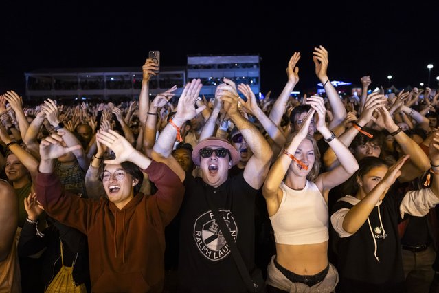 Festivalgoers attend the DJ Lost Frequencies performance on the Vega stage during the 48th edition of the Paleo Festival, in Nyon, Switzerland, 23 July 2025. The Paleo is an open-air music festival in the western part of Switzerland with about 250,000 spectators in six days and takes place from 22-27 July. (Photo by Cyril Zingaro/EPA)
