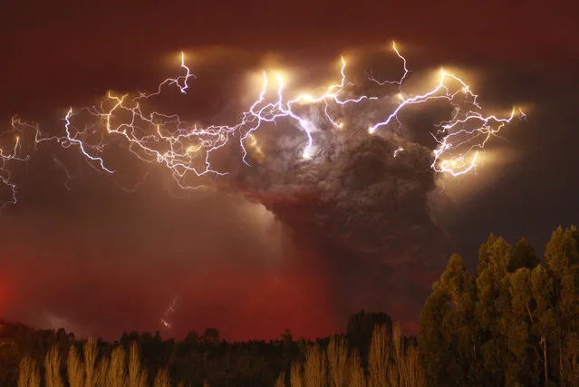 Lightning flashes around the ash plume above the Puyehue-Cordon Caulle volcano chain near Entrelagos, June 5, 2011. (Photo by Carlos Gutierrez/Reuters)