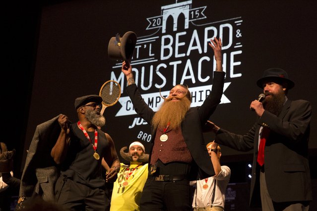 Scott Metts from Orlando, Florida, celebrates after winning the 2015 Just For Men National Beard & Moustache Championships at the Kings Theater in the Brooklyn borough of New York City, November 7, 2015. (Photo by Elizabeth Shafiroff/Reuters)