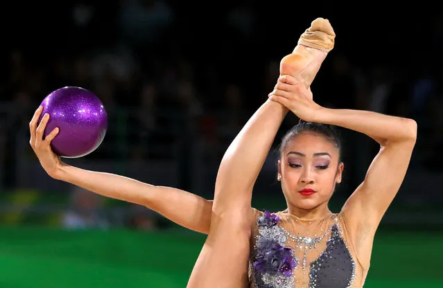 Katherine Uchida of Canada performs with the ball in the Individual All-Around Final during the Rhythmic Gymnastics on day eight of the Gold Coast 2018 Commonwealth Games at Coomera Indoor Sports Centre on April 11, 2018 on the Gold Coast, Australia. (Photo by David Gray/Reuters)