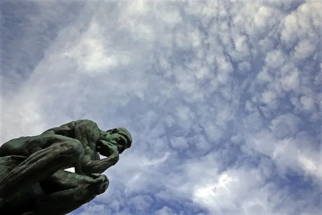 The sculpture "Le Penseur" (The Thinker, 1903) by French sculptor Auguste Rodin (1840-1917) is seen in the garden of the Musee Rodin in Paris, France, November 5, 2015. (Photo by Philippe Wojazer/Reuters)