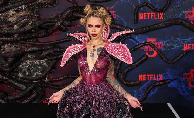 Eleanor Barnes dressed as the Demogorgon character attends the premiere for the final season of the television series “Stranger Things” at the TCL Chinese Theatre in Los Angeles, California, U.S., November 6, 2025. (Photo by Daniel Cole/Reuters)