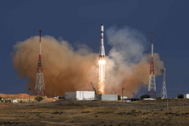 In this photo released by Roscosmos space corporation, the Soyuz-2.1a rocket booster with Progress MS-28 space cargo ship lifts off from the launch pad at the Russian leased Baikonur cosmodrome, Kazakhstan, Thursday, August 15, 2024. The docking of Progress MS-28 cargo ship to the Russian segment of the International Space Station is scheduled for Aug. 17. (Photo by Ivan Timoshenko/Roscosmos space corporation via AP Photo)