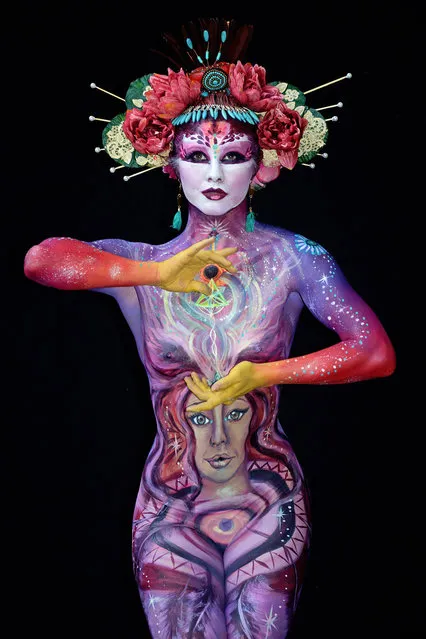 A model, painted by bodypainting artist Wing Sum Diana Chan from Australia, poses for a picture at the 21st World Bodypainting Festival 2018 on July 14, 2018 in Klagenfurt, Austria. (Photo by Didier Messens/Getty Images)